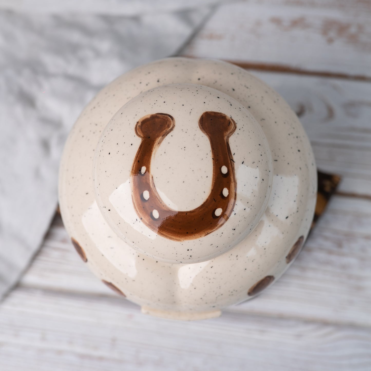 Top view of the personalized ceramic urn lid with floral sunflower design