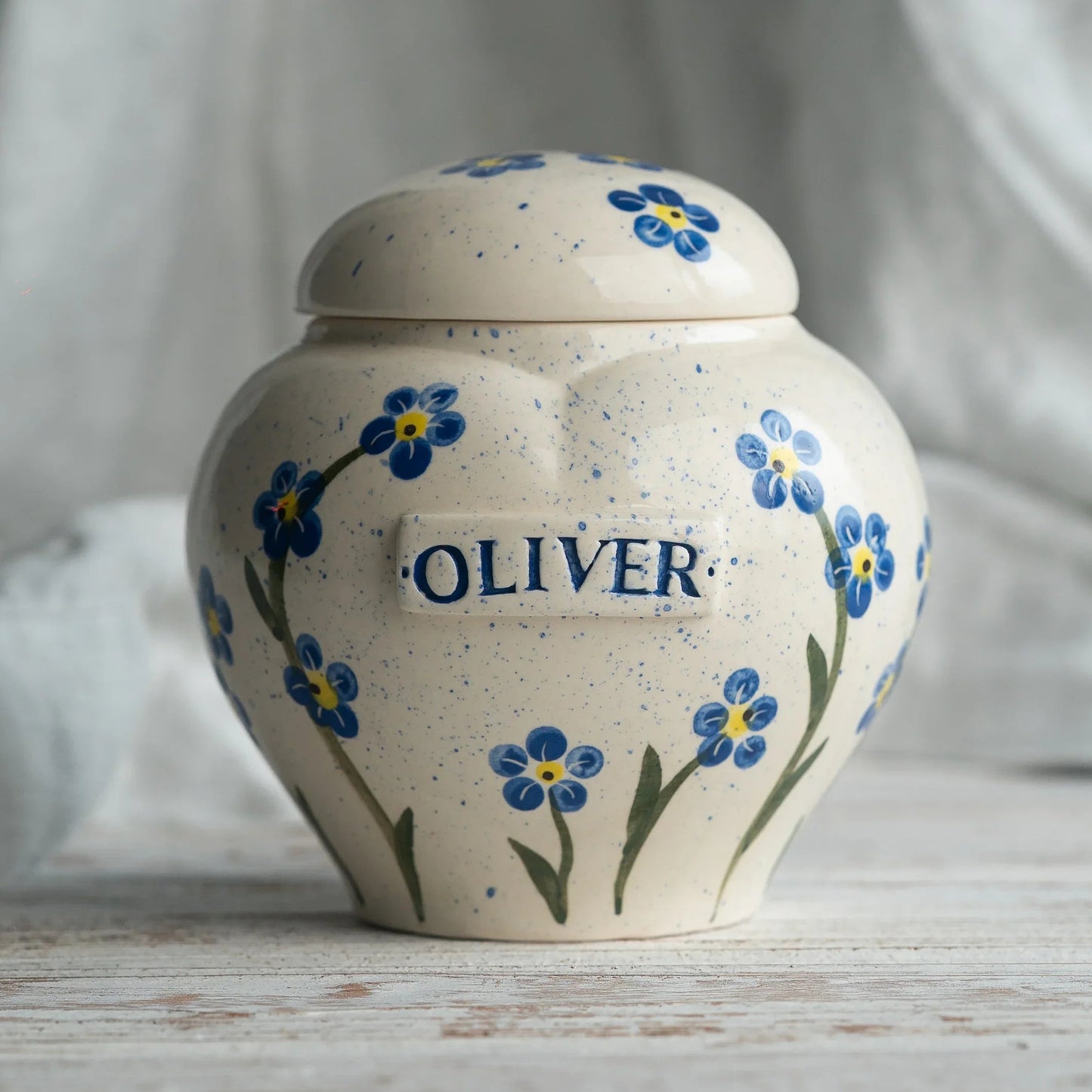 Hand-painted forget-me-nots ceramic heart urn