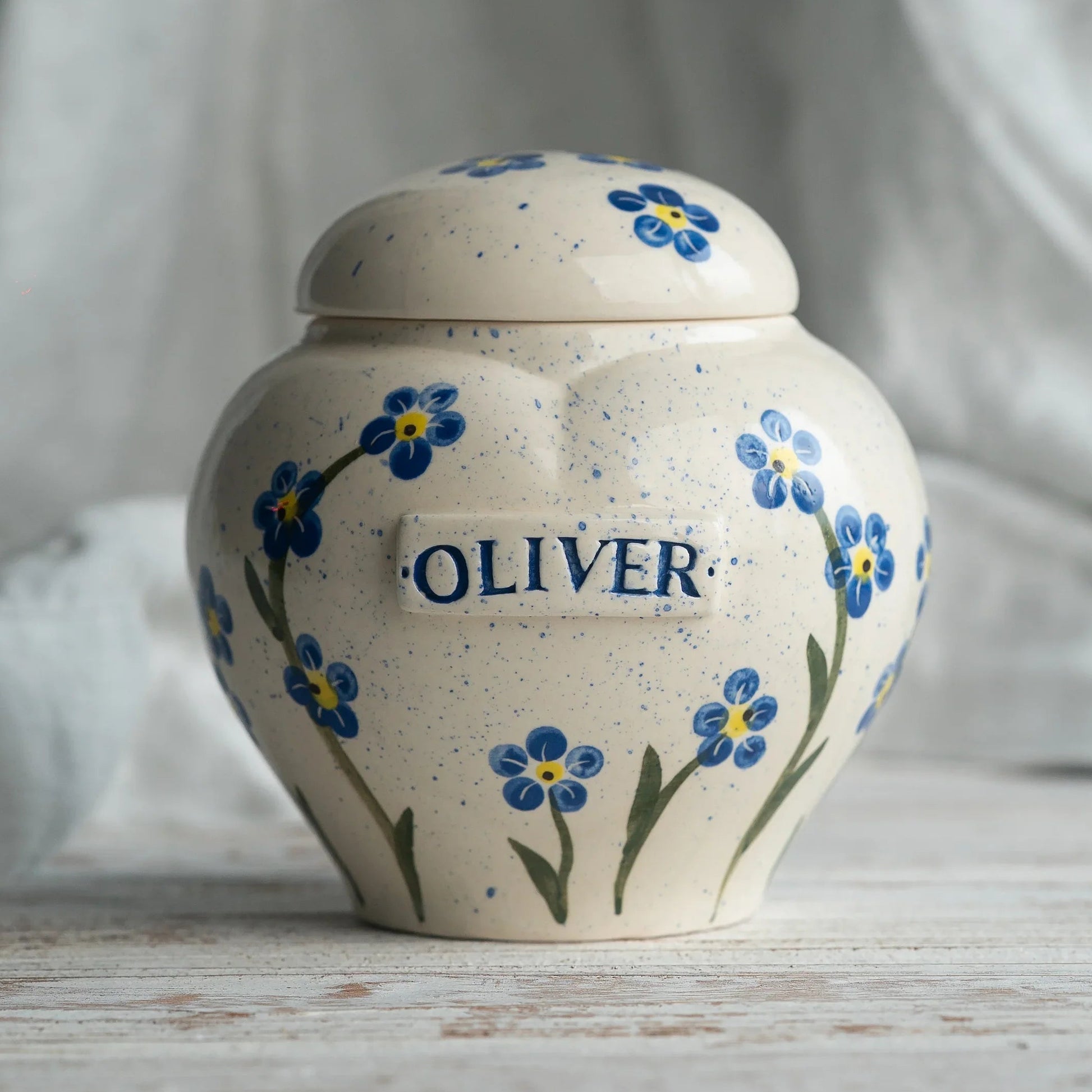 Hand-painted forget-me-nots ceramic heart urn