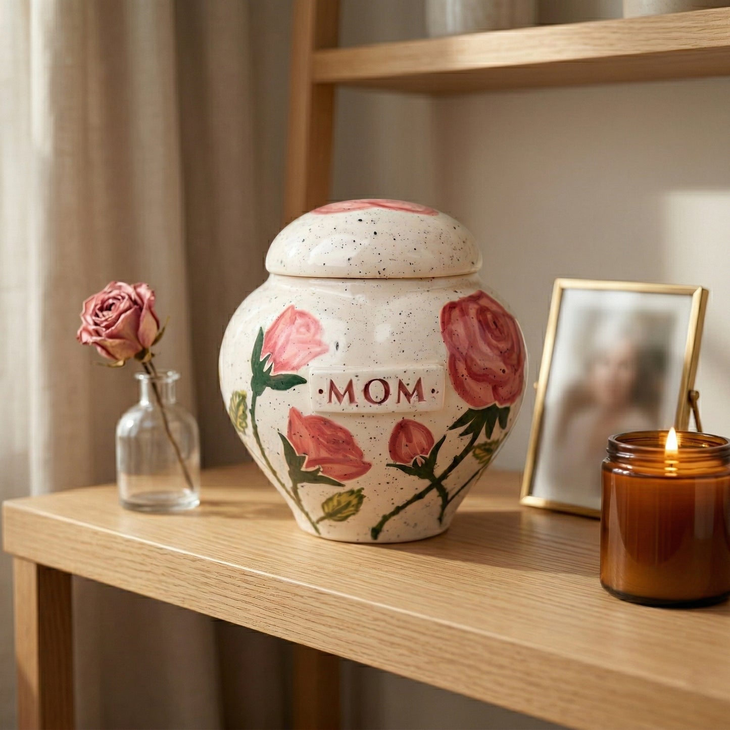 Pink rose ceramic heart urn in a cozy memory corner