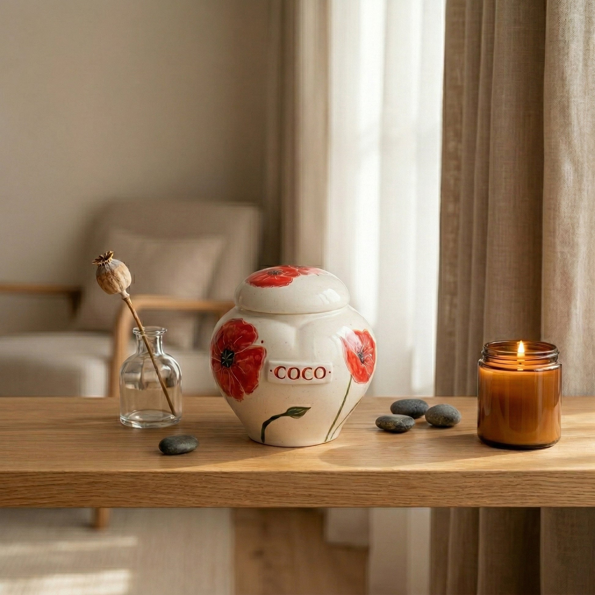 Red poppy ceramic heart urn in a warm and cozy memory corner