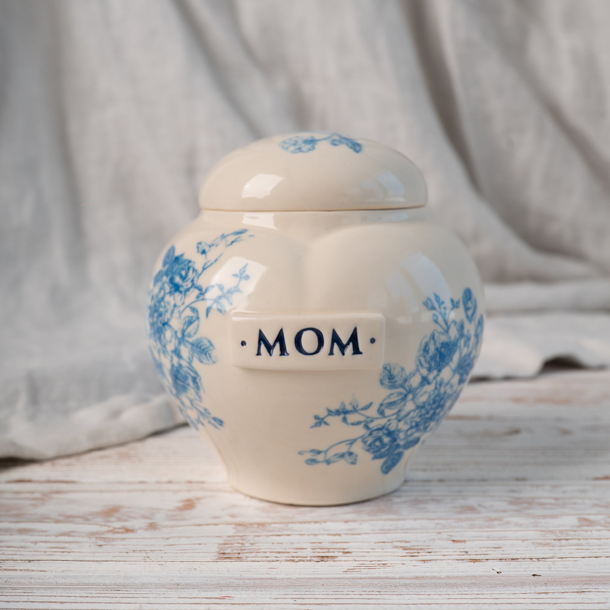 Custom seamless pattern heart keepsake urn with blue and white floral toile design front view