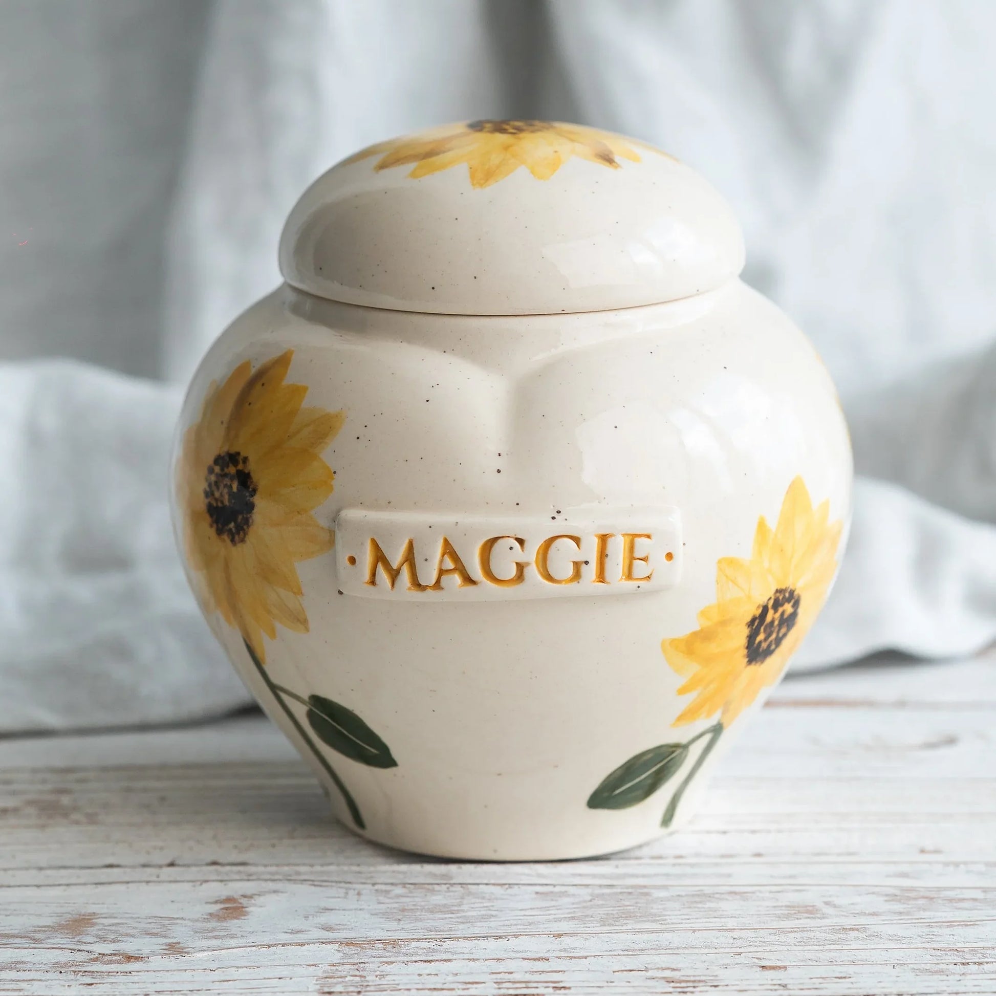 Hand-painted yellow sunflower ceramic heart urn