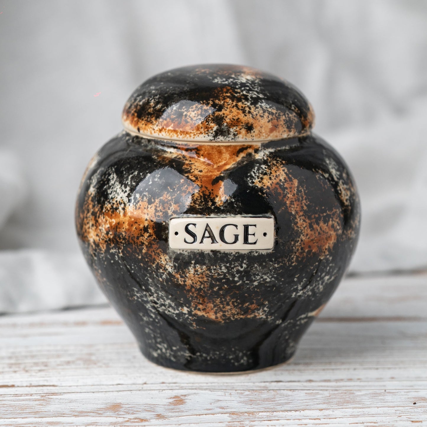 Hand-painted tortoiseshell cat ceramic heart urn