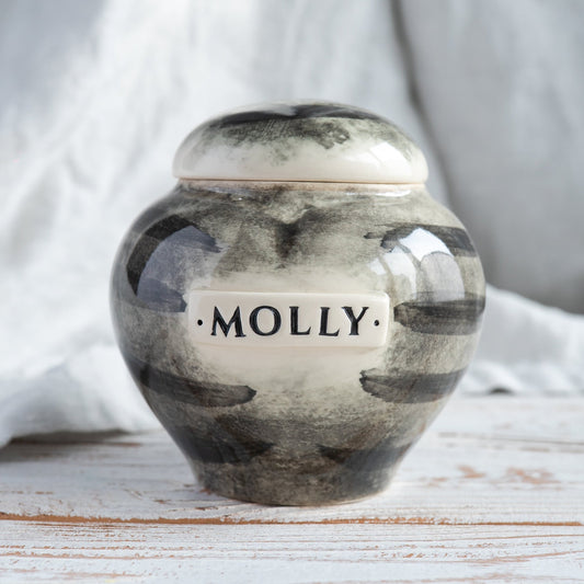 Hand-painted white ceramic heart-shaped urn with grey tabby mackerel stripes