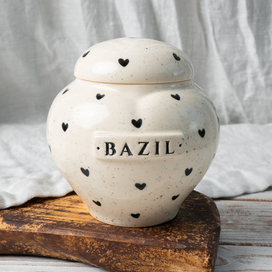 Personalized heart ceramic keepsake urn for human or pet ashes with heart print design front view