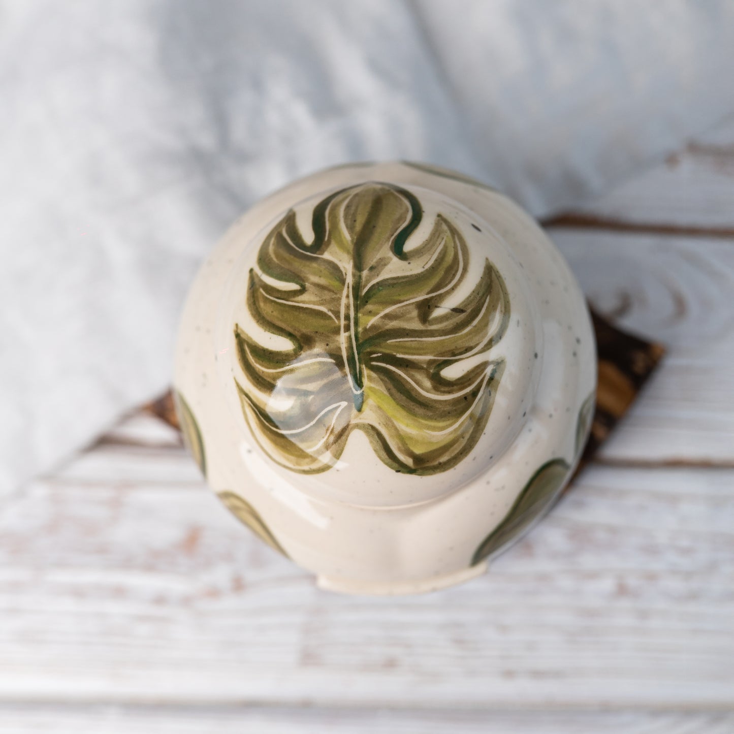 Top-down view of the urn's matching lid