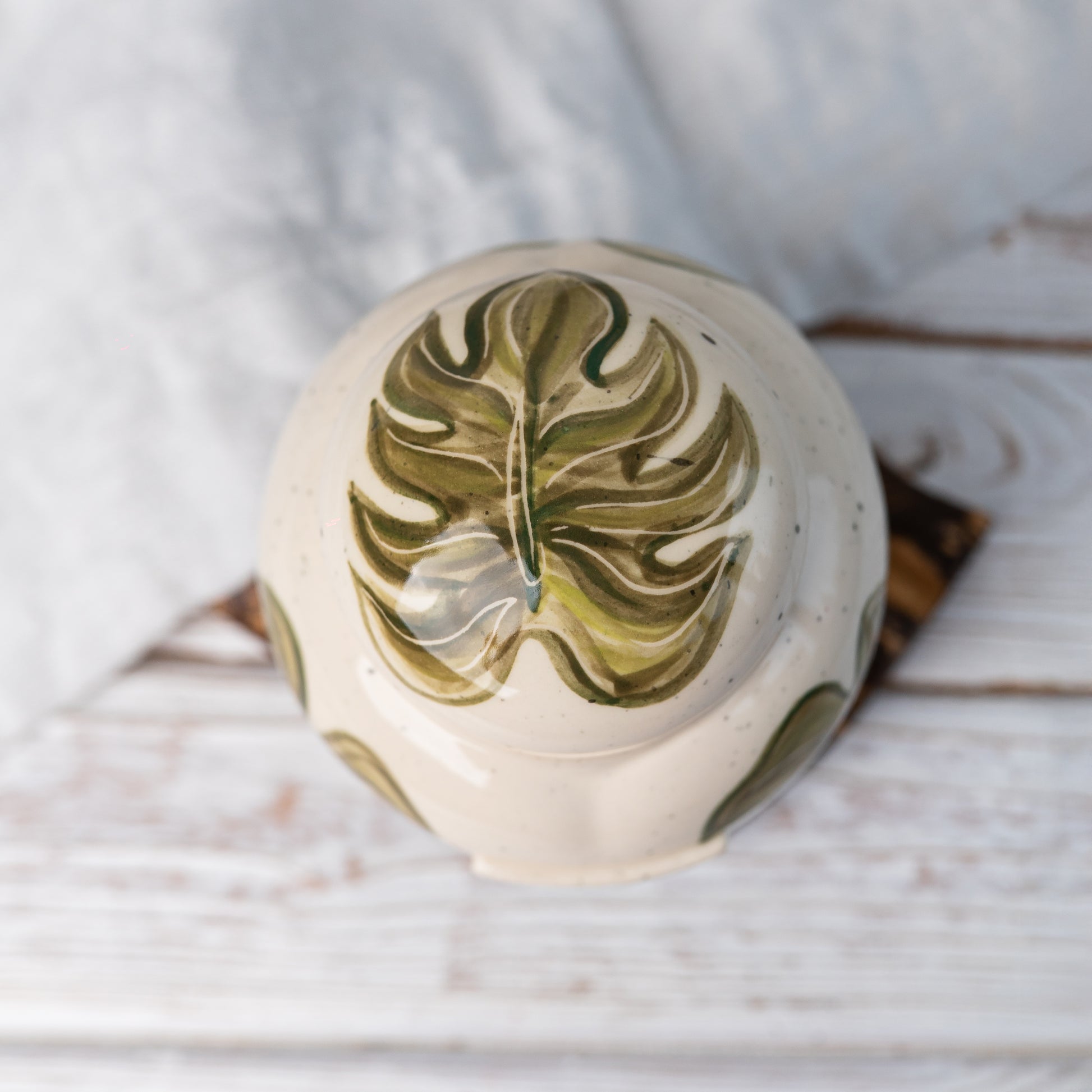 Top-down view of the urn's matching lid