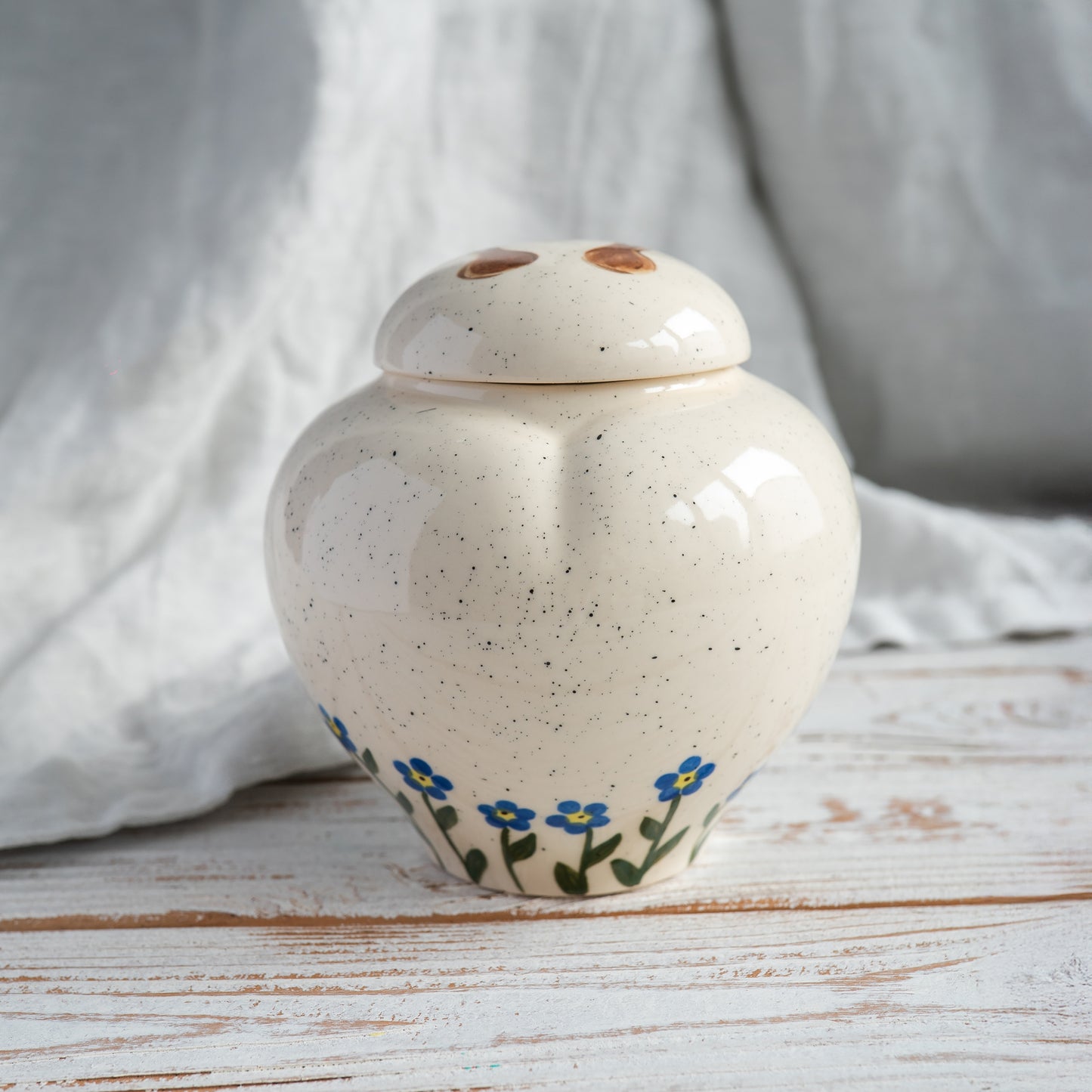 back side view of a personalized heart-shaped horse urn 