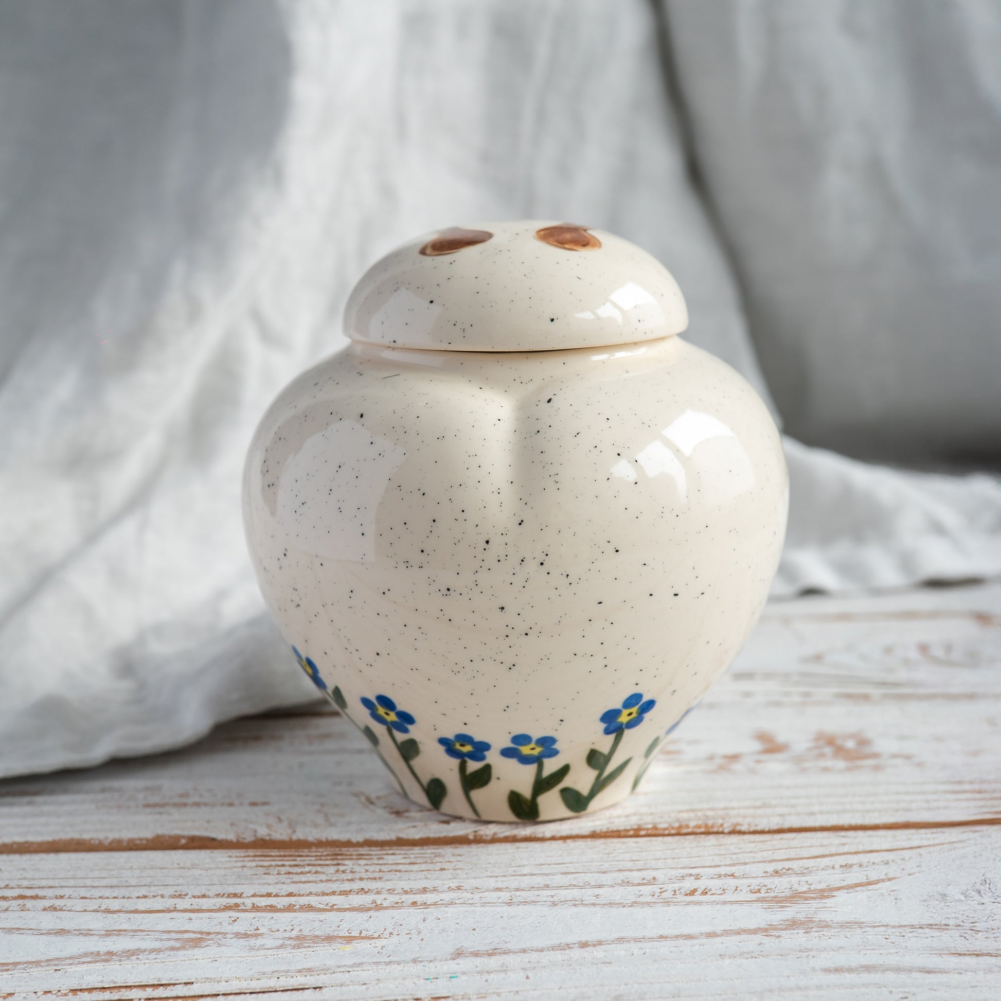 back side view of a personalized heart-shaped horse urn 