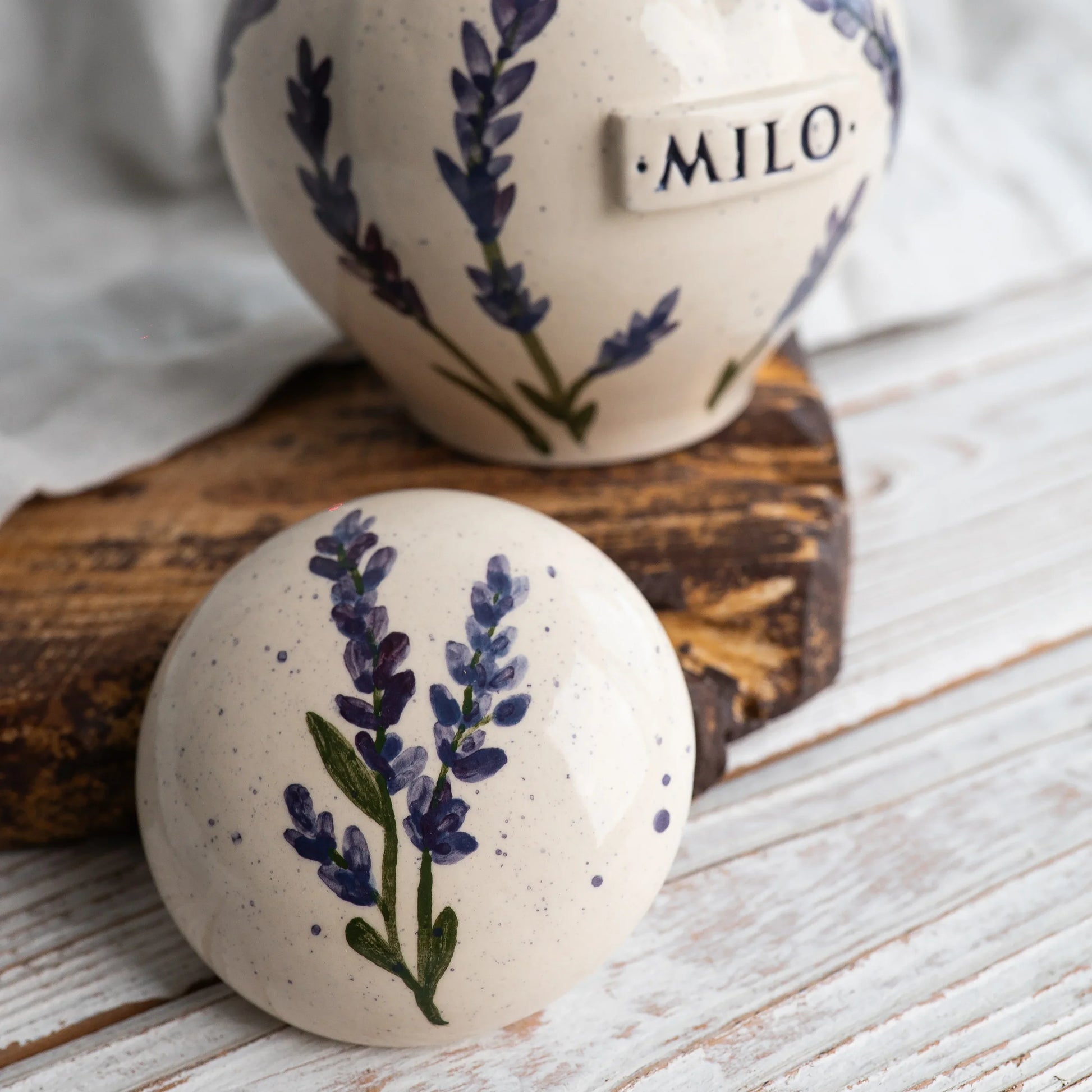 Close-up of open lavender ceramic heart urn detail
