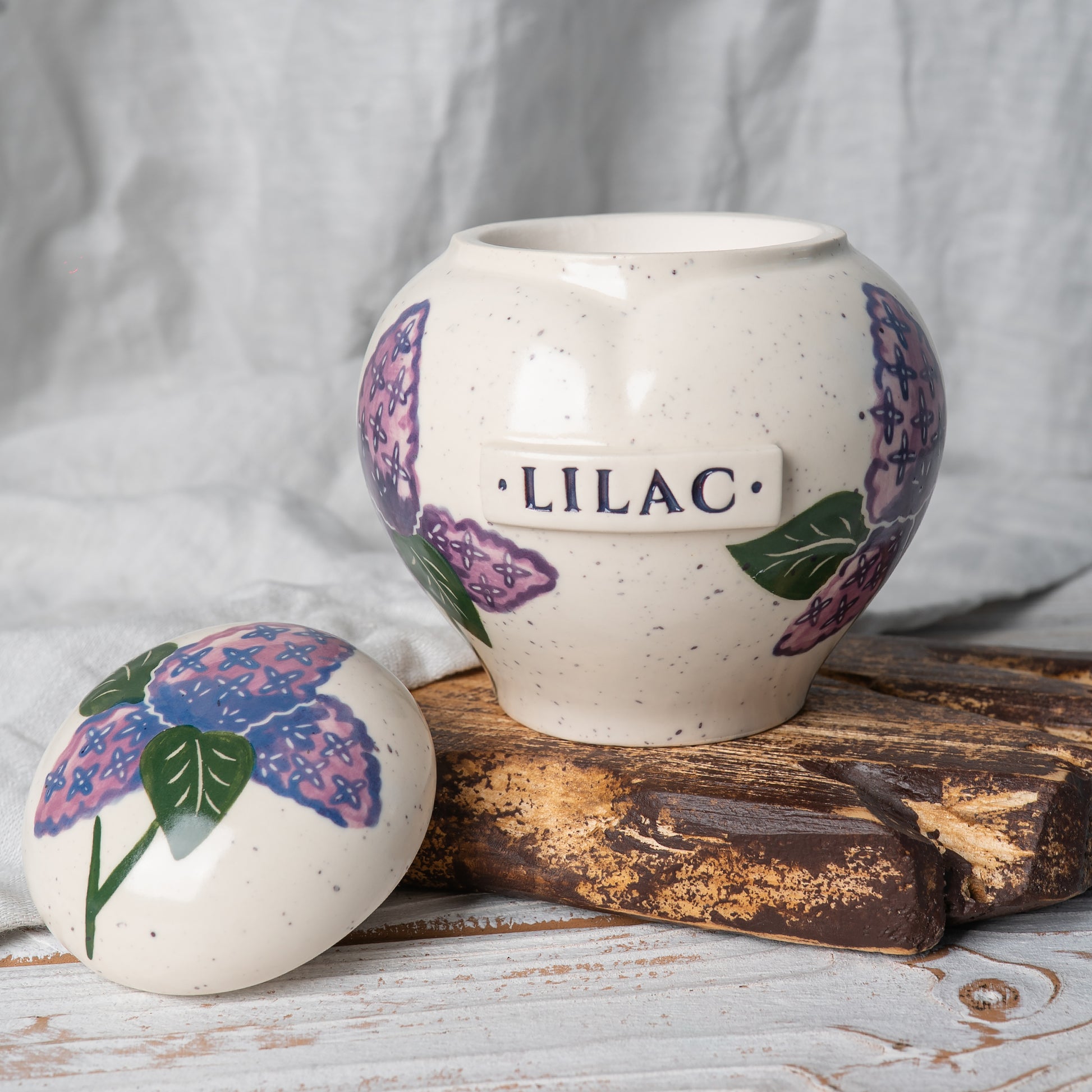 Close-up of open lilac ceramic heart urn
