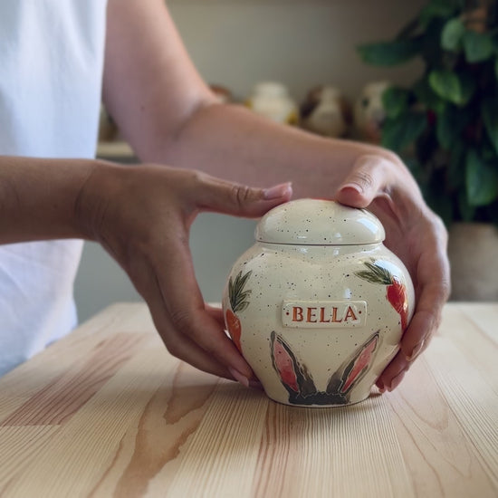 Video showcase of the hand-painted rabbit ears and carrots heart urn