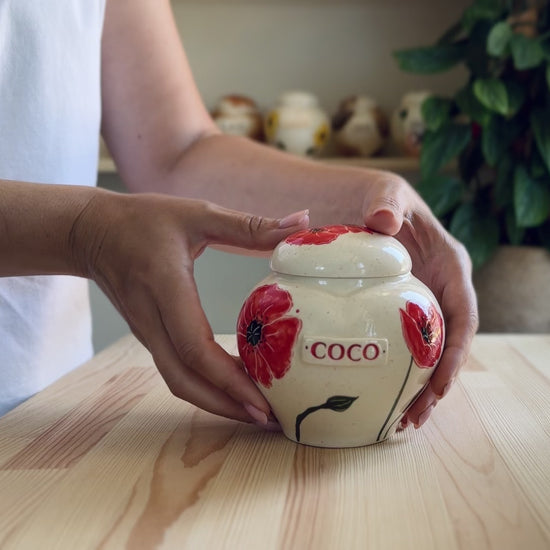 Video showcase of the hand-painted poppy heart urn
