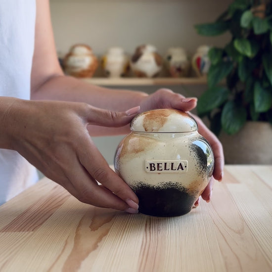 Video showcase of the hand-painted Calico cat heart urn by Mira Ceramics