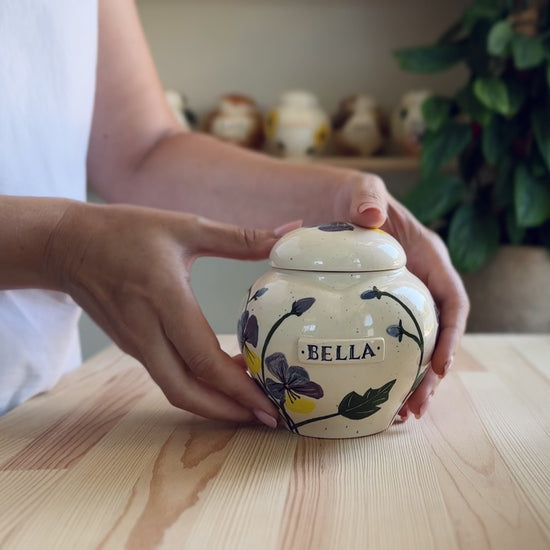 Video showcase of the hand-painted pansies heart urn