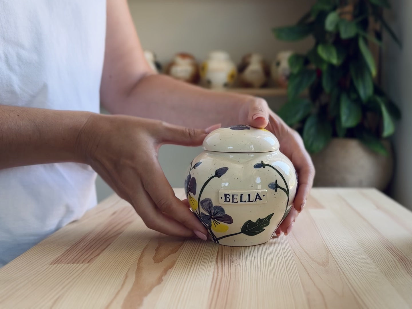 Video showcase of the hand-painted pansies heart urn