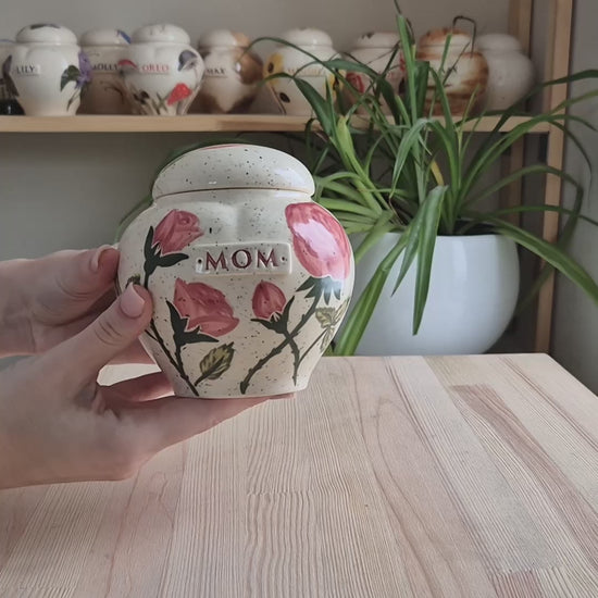 Video showcase of the hand-painted pink rose heart urn by Mira Ceramics