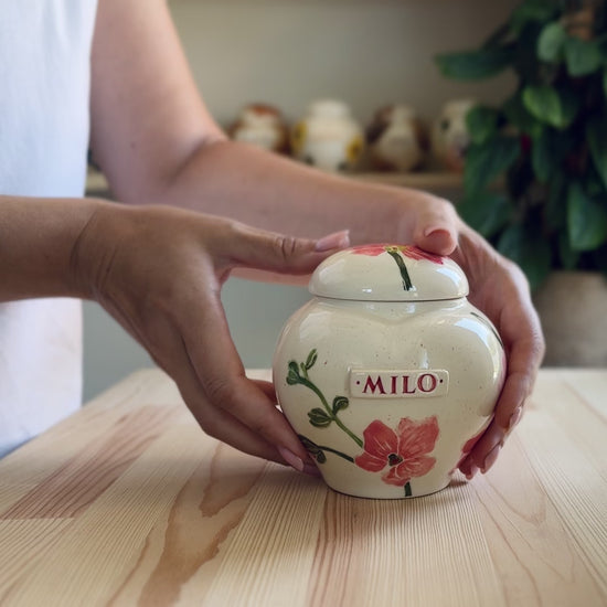 Video showcase of the hand-painted orchid heart urn