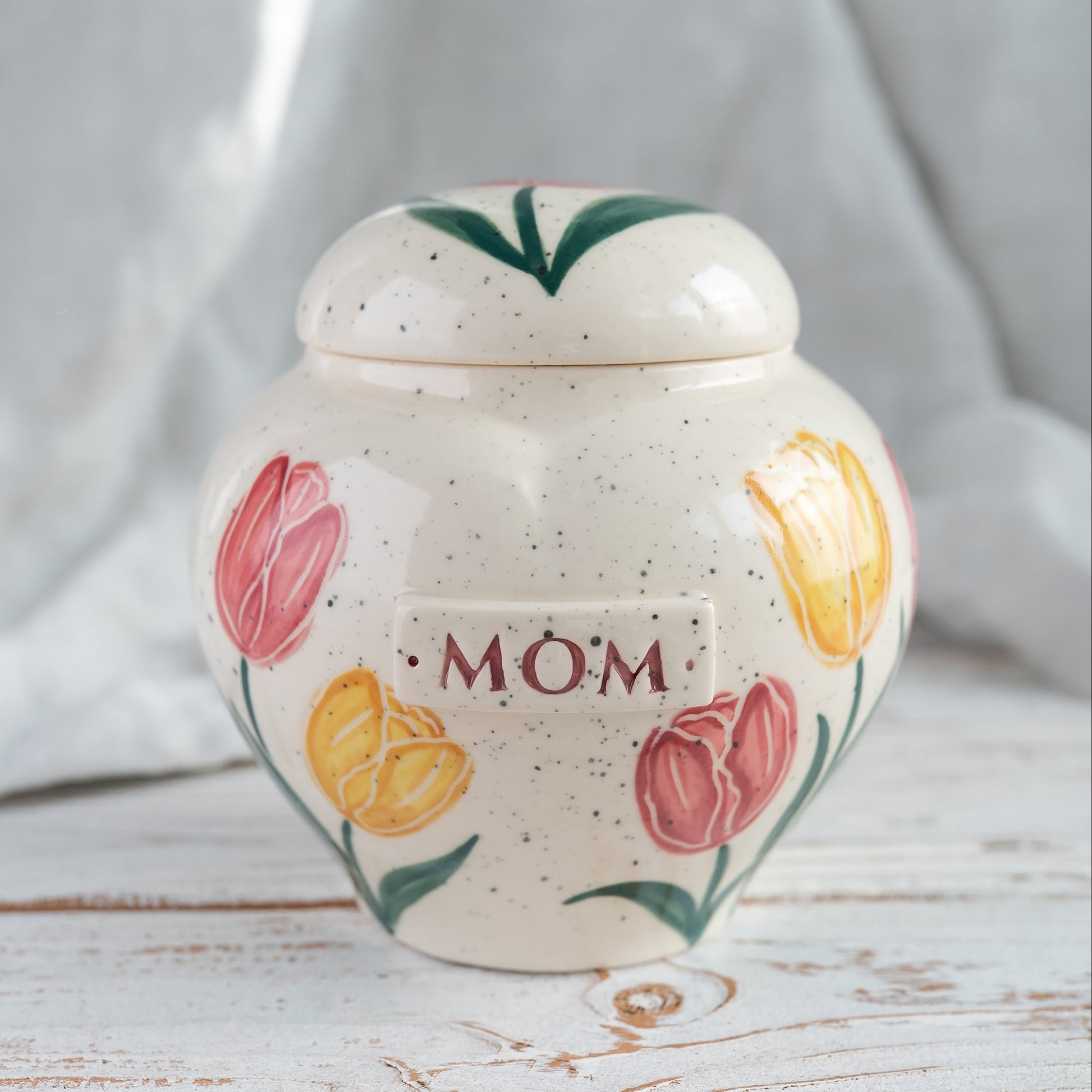 Hand-painted tulip ceramic heart-shaped sharing urn for a portion of Mom or Dad's ashes.